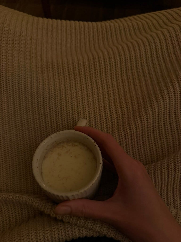 making yourself a cup of warm milk at night