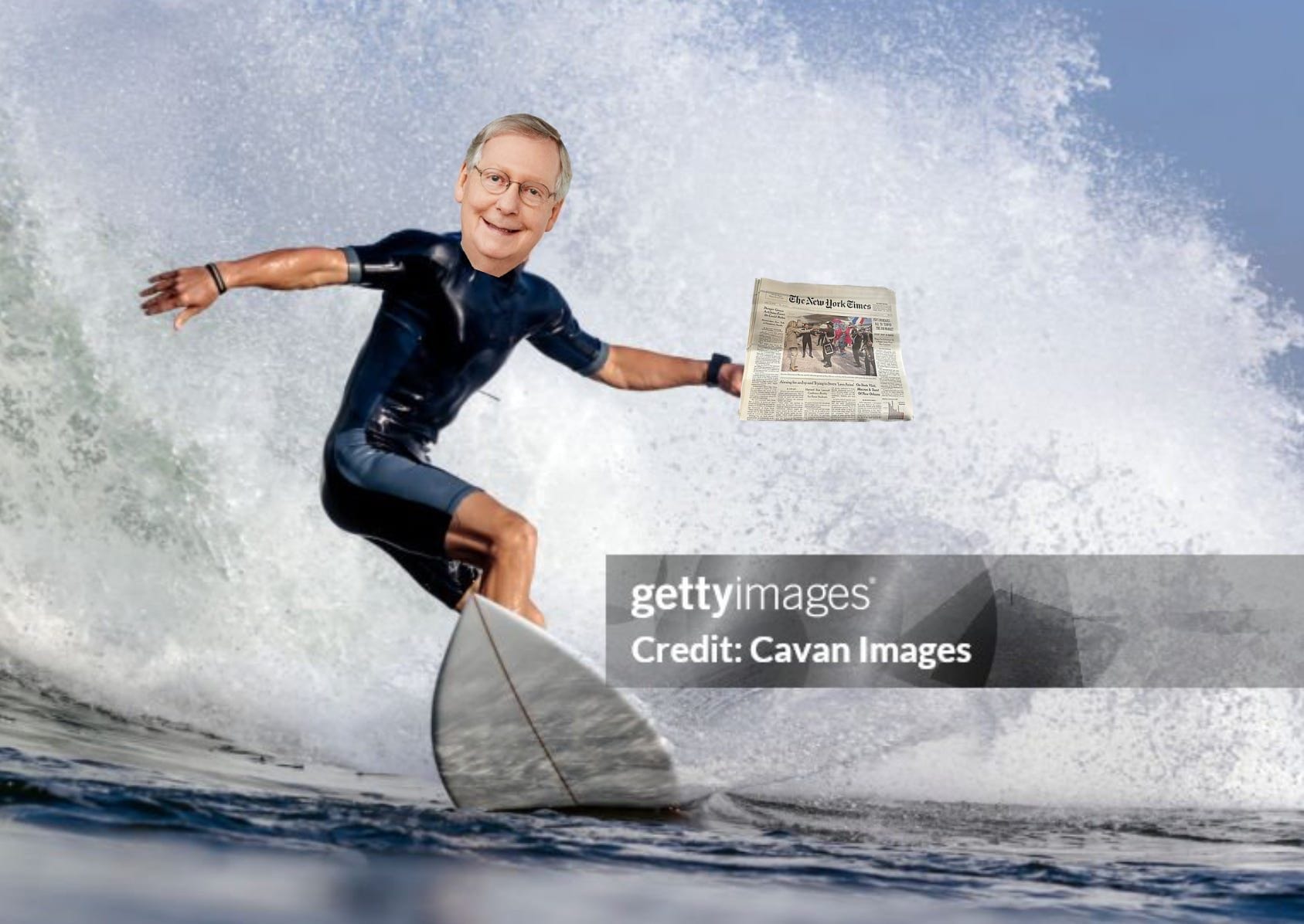 Mitch McConnell Surfing with Newspaper