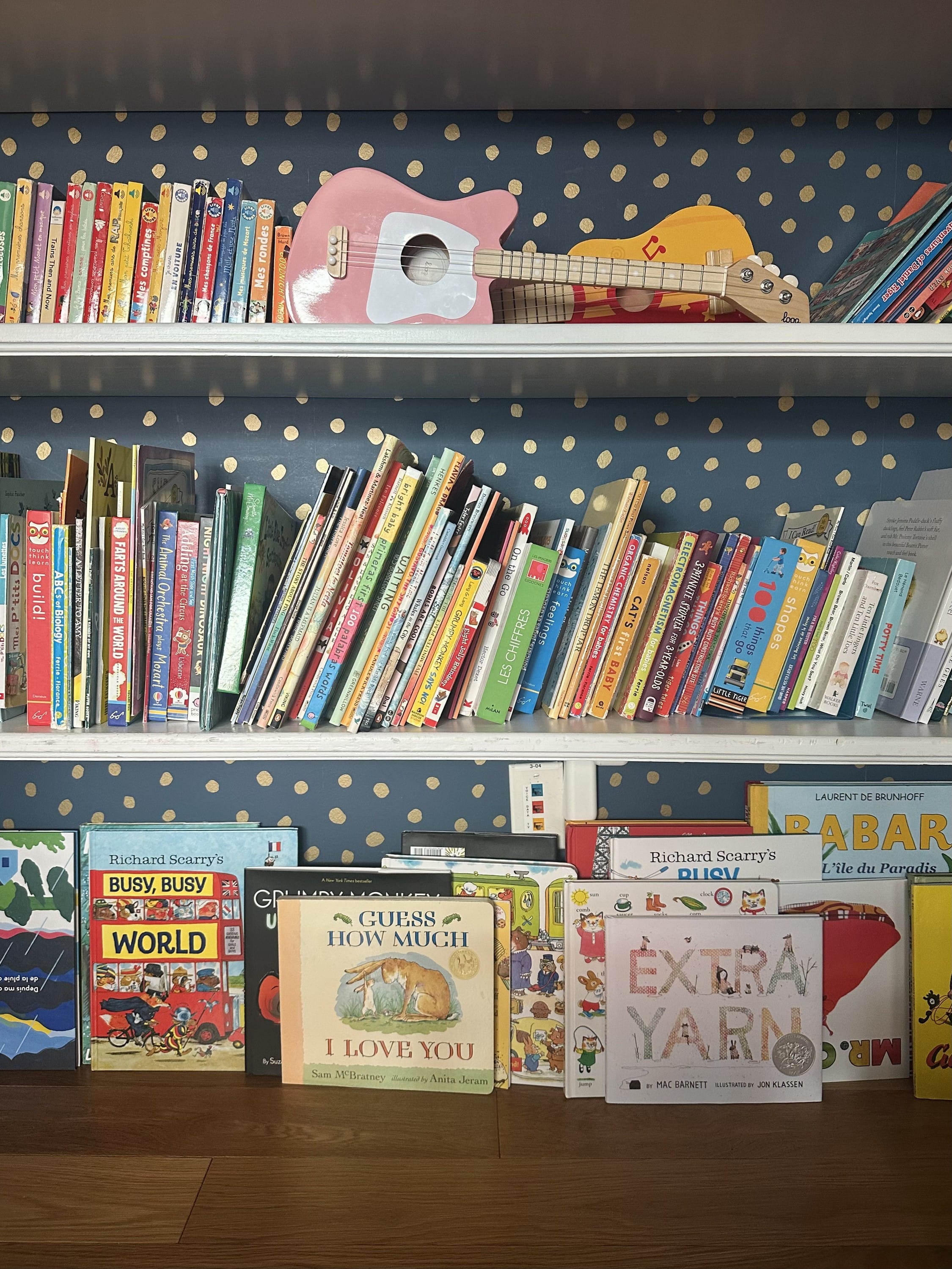 Turning the lower book shelves in our living room into the kid’s library