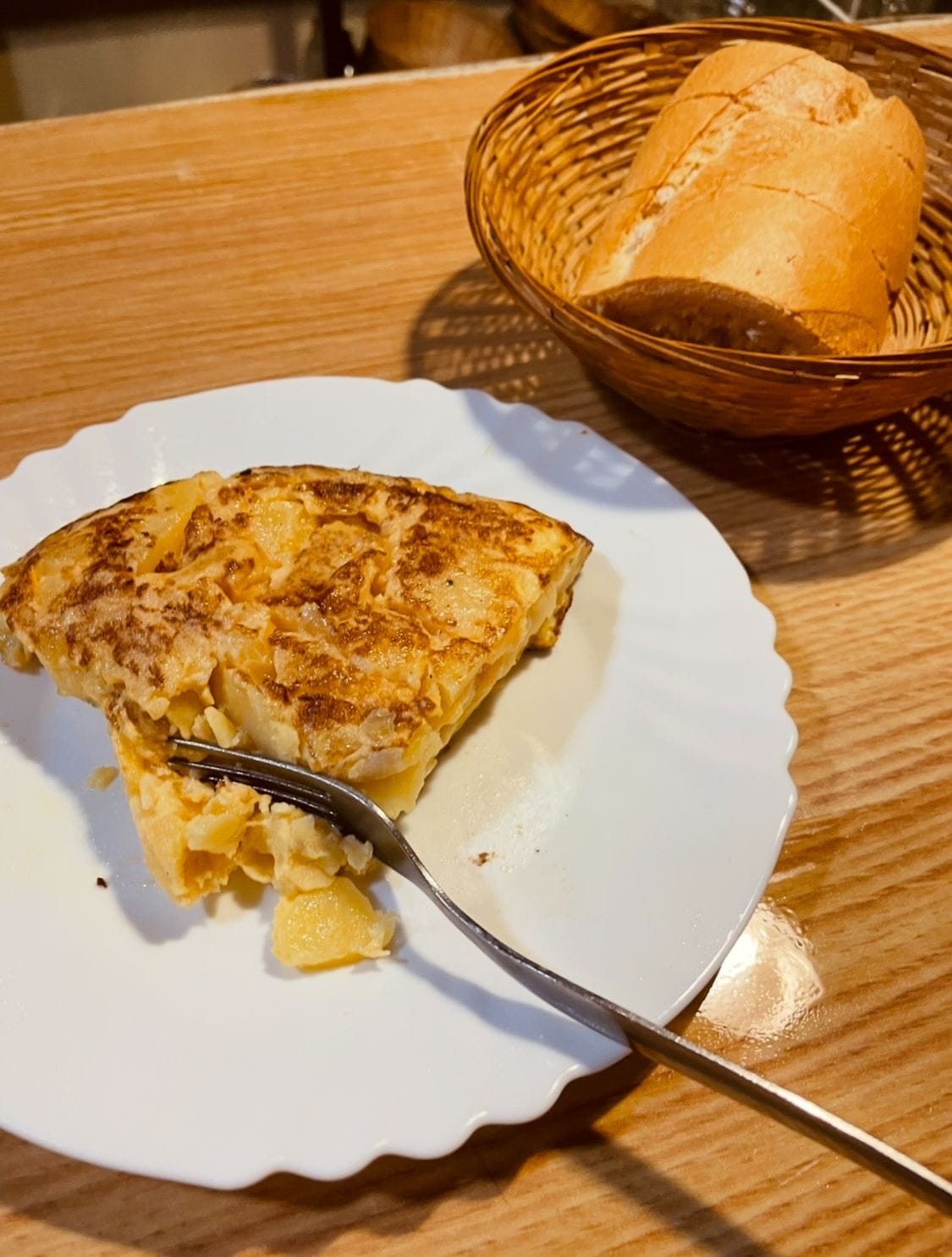 Go sit in an old-timey bar and order a tortilla and café con leche for breakfast
