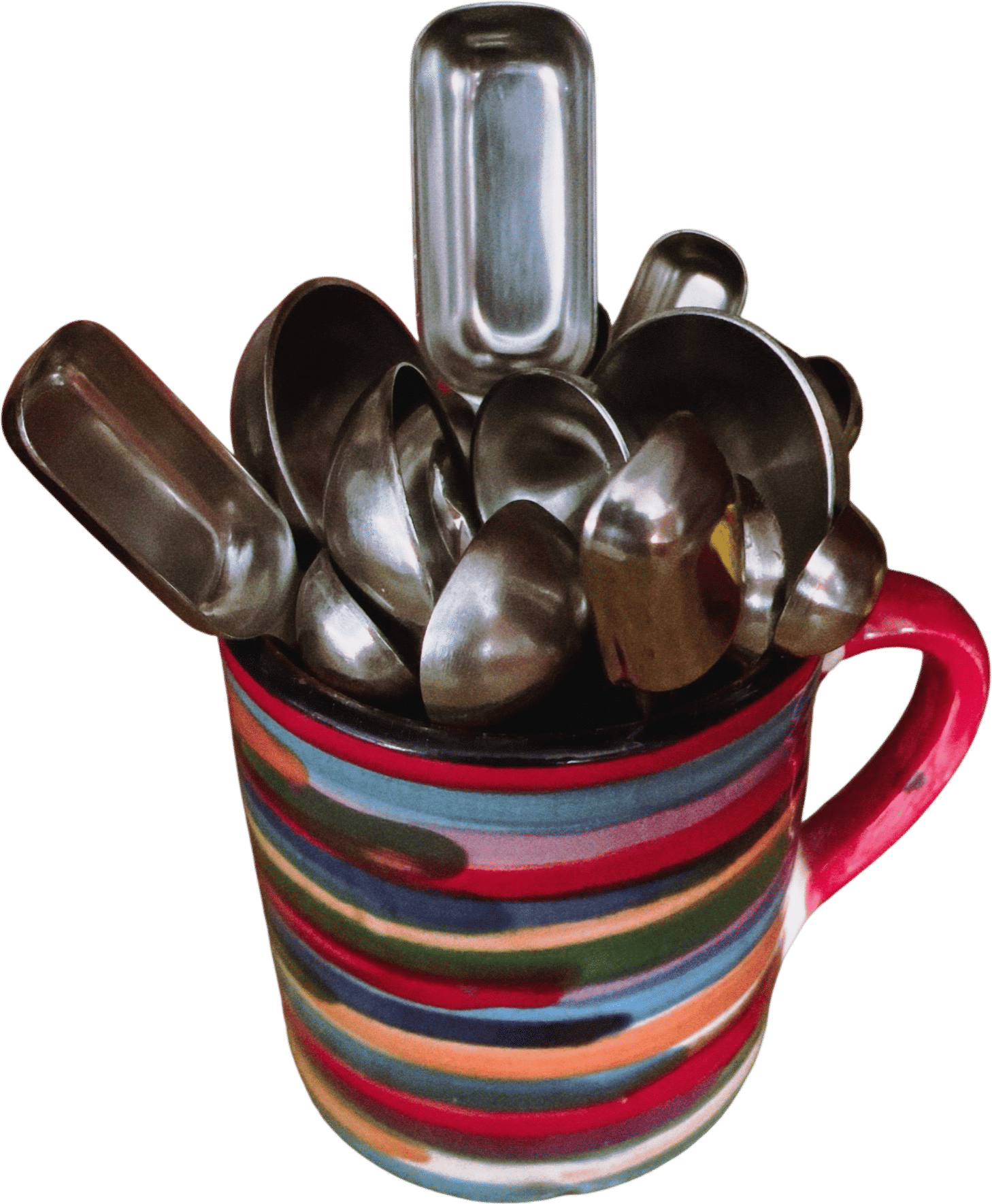 Mug of Measuring Spoons on the Counter