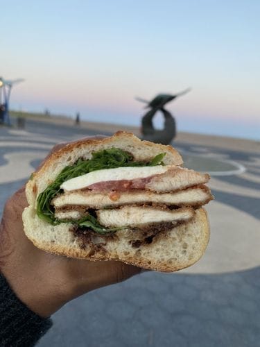 getting a chicken cutlet hero from royal crown and taking it to the beach