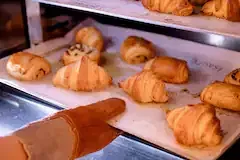 Learning to bake classic croissants in Paris