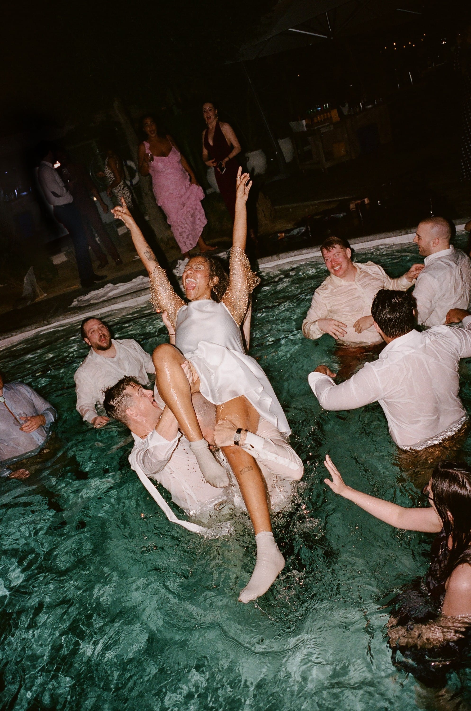 jumping in the pool with my (second) wedding dress on