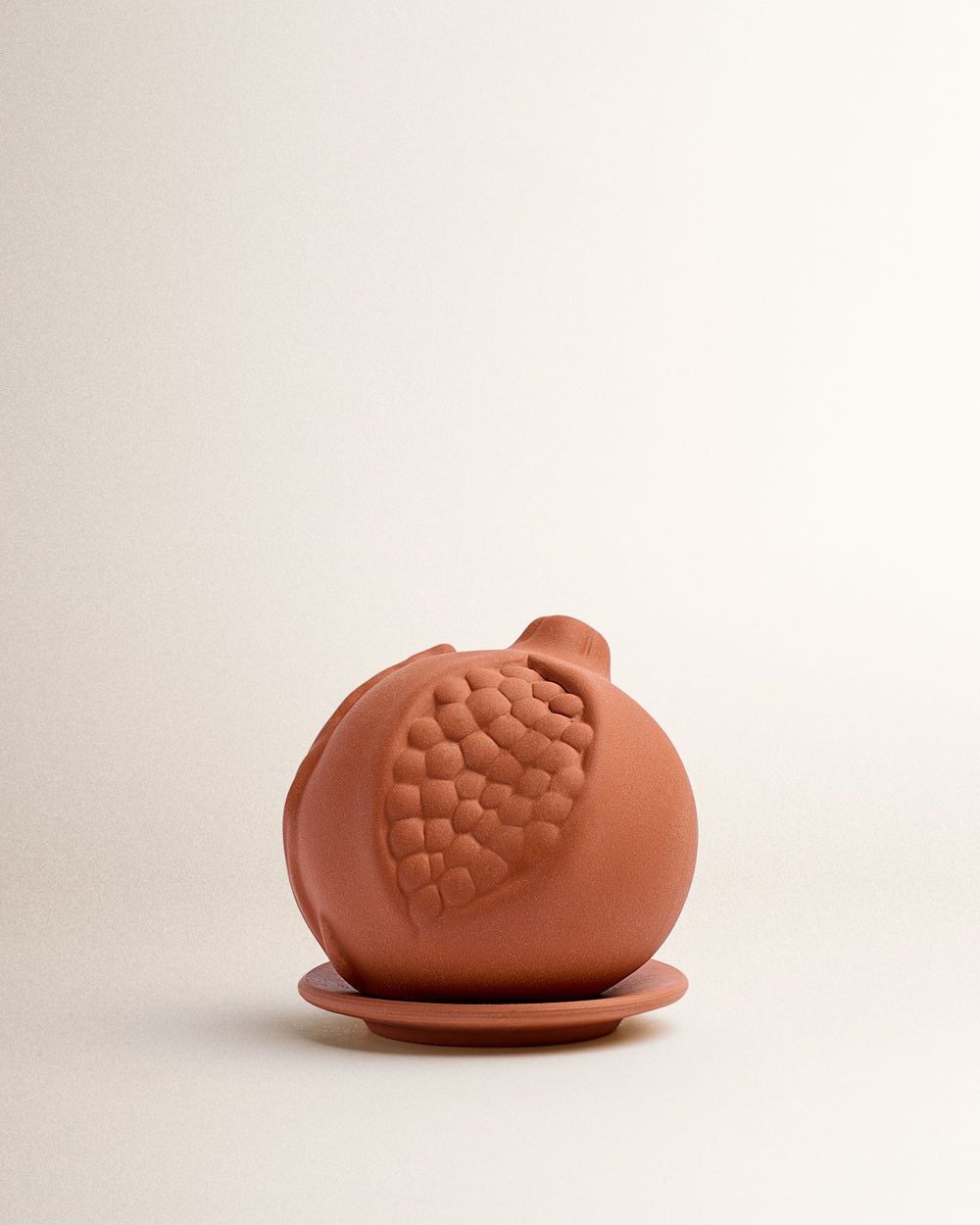 a scented terracotta pomegranate