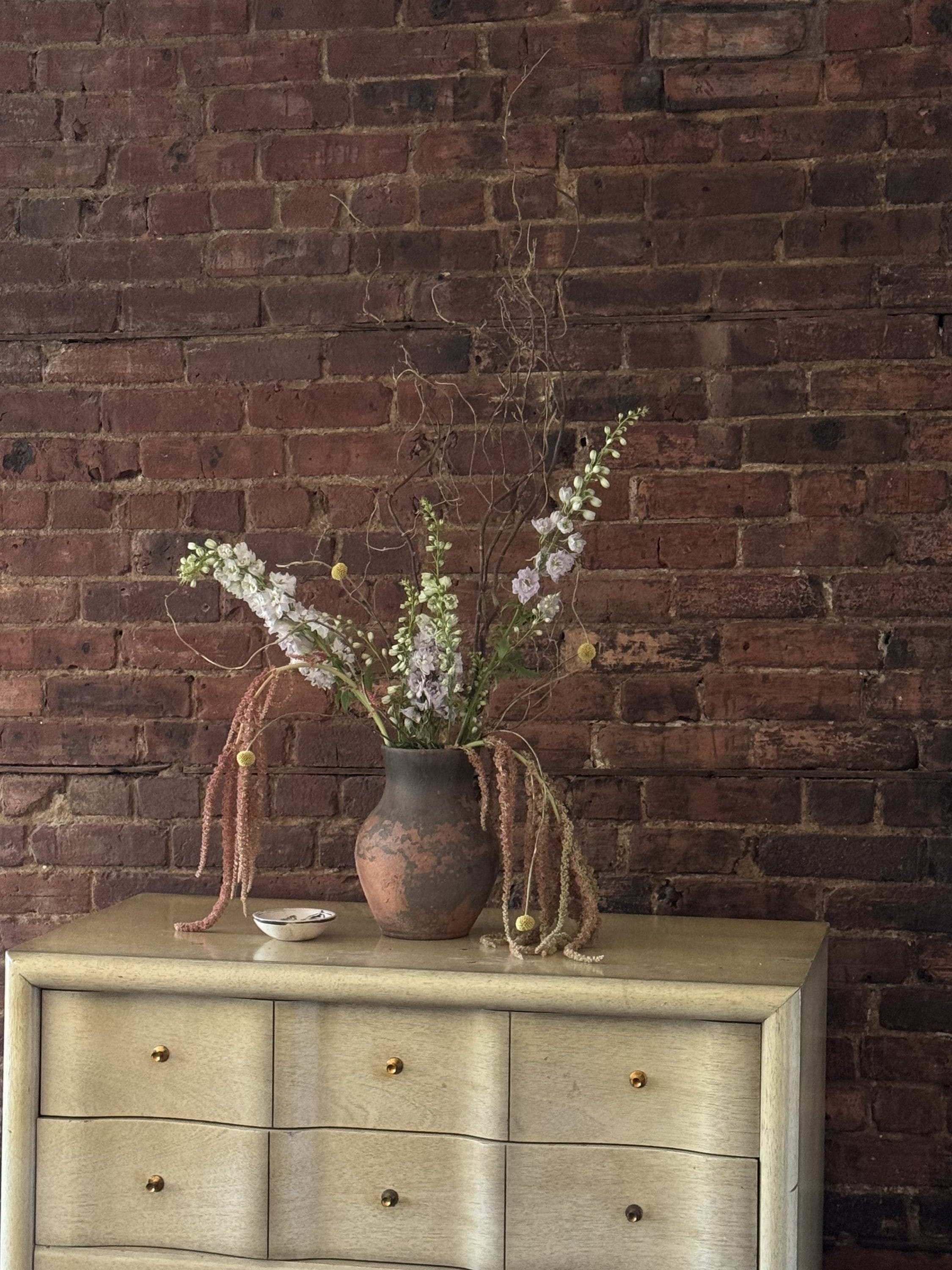 dramatic flower arrangements on top of your dresser