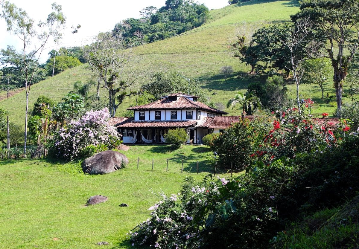 Rustic Colonial House Inside Tropical Forest