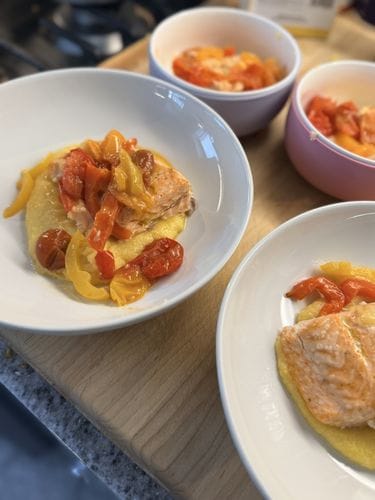 Sheet-Pan Salmon with Jammy Tomatoes and Peppers and Polenta Recipe