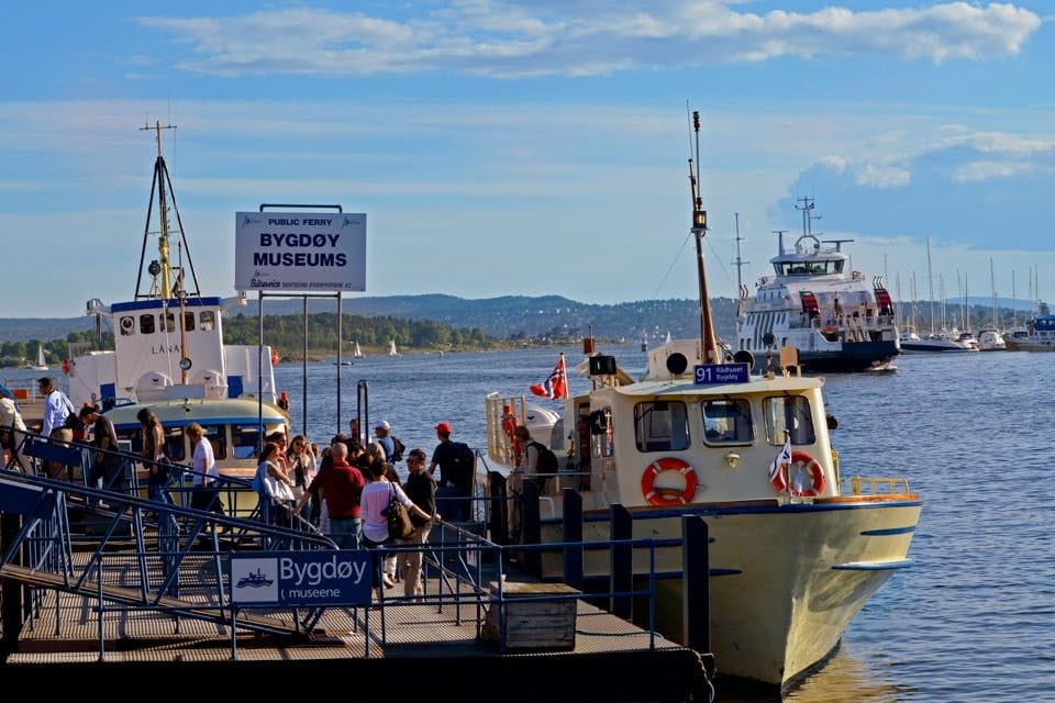 Buy an Oslo train pass.