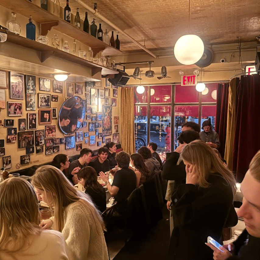 CANDLE LIT WITH EVERYONE ON THE WALL