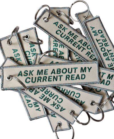 Ask Me About My Current Read Keychain