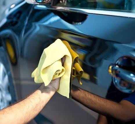 Clean your car while waiting for your curbside pickup