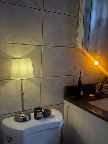 Showering by lamp light