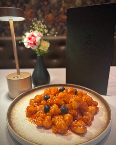 Crispy Chicken in blueberry sauce- Jiang Naan