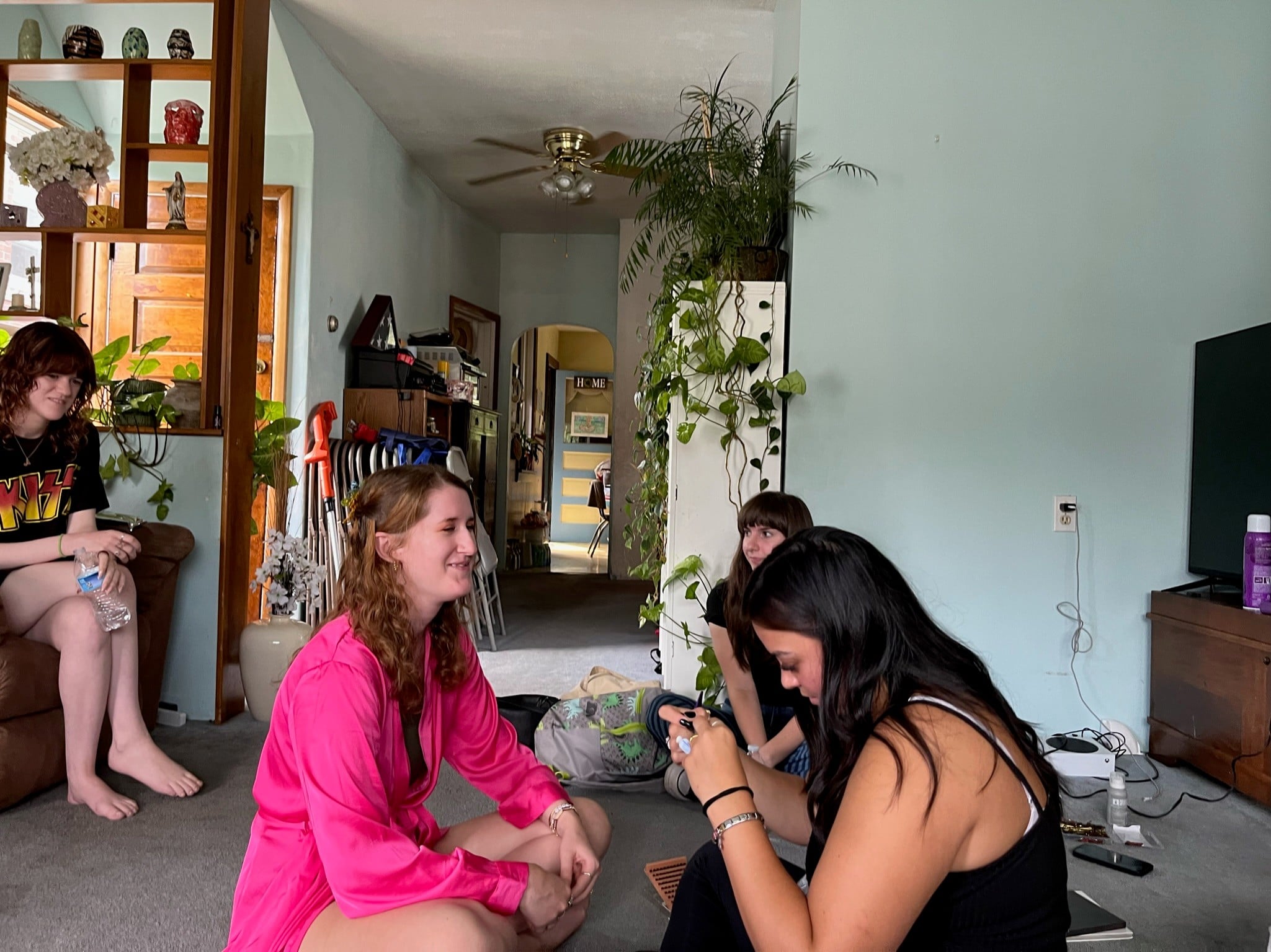 Getting ready in my childhood living room with my friends even the ones who weren't bridesmaids