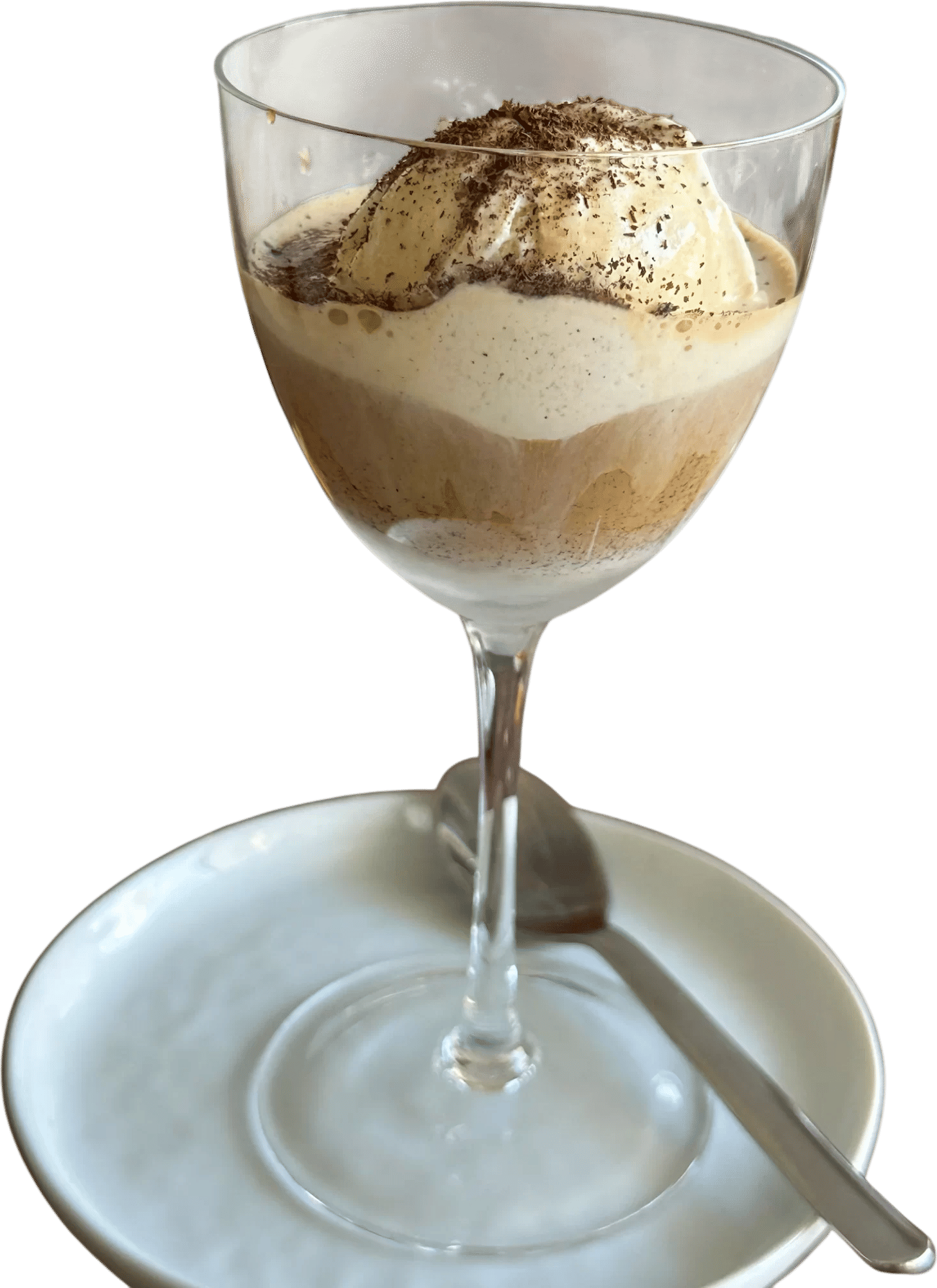 Pouring Freshly Brewed Espresso Over Vanilla Ice Cream